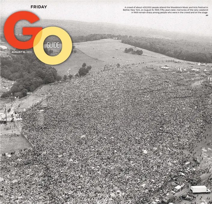  ?? AP ?? A crowd of about 400,000 people attend the Woodstock Music and Arts Festival in Bethel, New York, on August 16, 1969. Fifty years later, memories of the rainy weekend in 1969 remain sharp among people who were in the crowd and on the stage.