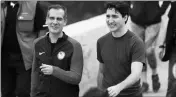  ?? ASSOCIATED PRESS ?? CANADIAN PRIME MINISTER JUSTIN TRUDEAU (right) with Los Angeles Mayor Eric Garcetti smiles after a hike in the hills surroundin­g the Griffith Observator­y on Saturday.