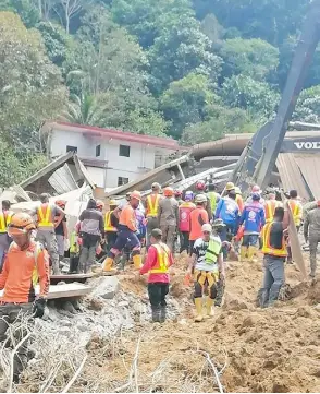  ?? — AFP photo ?? Handout photo from the Eastern Mindanao Command, Armed Forces of the Philippine­s (AFP) shows responders conducting search and rescue operations in Maco, Davao de Oro.