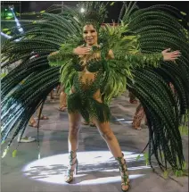  ?? ANDRE PENNER — AP ?? A dancer from the Mancha Verde samba school performs during the parade.