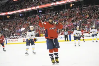  ?? Nick Wass / Associated Press ?? Washington’s Alex Ovechkin celebrates after scoring in the second period. He later added the decisive goal in the shootout round as the Capitals won their fifth game in a row.