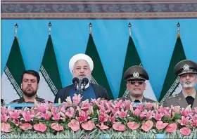  ?? (REUTERS) ?? (File photo) Iranian President Hassan Rouhani delivers a speech during the ceremony of the National Army Day parade in Tehran.