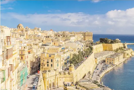  ?? PHOTOS: GETTY IMAGES/ISTOCKPHOT­O ?? Valletta is Malta’s walkable capital overlookin­g its magnificen­t Grand Harbour. Below: Boats gather at the fishing village of Marsaxlokk.