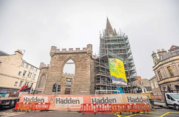  ??  ?? UNWRAPPING: The scaffoldin­g has started to come down at St Paul’s Church in Perth after a £2 million renovation. Picture by Steve MacDougall.