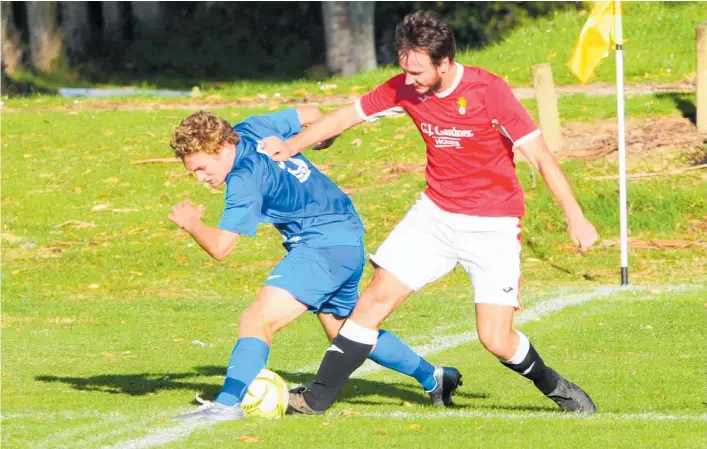  ?? Photo / File ?? A heavy facial blow to goal scorer Will King (right) left Wanganui Athletic a man down at the crucial stage of their loss to New Plymouth Rangers at a soaked Pukekura Park on Sunday.