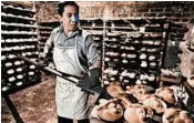  ?? GETTY ?? A baker tends to batches of pan de muerto, or “bread of the dead,” during last year’s Day of the Dead celebratio­ns in Mexico City.