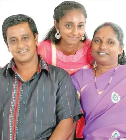  ?? ?? Fiji Sun journalist Shahani Mala with her parents, Ravi Chand (left) and Anjani Mala.
