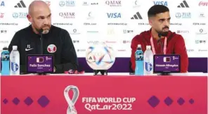  ?? (AFP) ?? Qatar’s Spanish coach Felix Sanchez (left) and captain Hassan al-Haydos attend a press conference at the Qatar National Convention Centre (QNCC) in Doha yesterday.