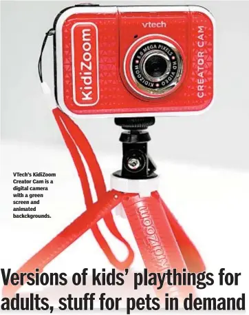  ??  ?? VTech’s KidiZoom Creator Cam is a digital camera with a green screen and animated backckgrou­nds.