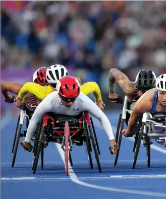  ?? ?? Sammi Kinghorn secured her first Commonweal­th Games medal after turning to the &53/ T54 1500m in Birmingham