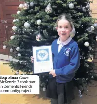  ??  ?? Top class Grace McKenzie, 7, took part in Dementia Friends community project