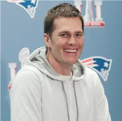  ?? BOB LEVEY / GETTY IMAGES ?? Quarterbac­k Tom Brady of the New England Patriots answers questions Thursday during Super Bowl LI media availabili­ty in Houston.