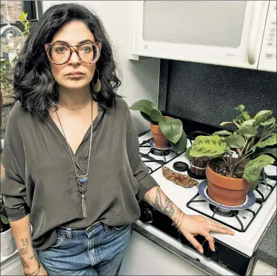  ??  ?? PAIN IN THE GAS: Hairstylis­t Kai Ravelson has been fighting for 10 months to get her gas turned back on after it was shut off following a citywide crackdown on gas leaks in the wake of a 2015 East Village explosion.