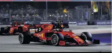  ??  ?? Vettel won while Leclerc (right) was frustrated