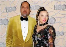  ?? PHOTO BY RICHARD SHOTWELL — INVISION — AP, FILE ?? In this file photo, Kenya Barris, left, and Dr. Rainbow Edwards-Barris arrive at the HBO Golden Globes afterparty in Beverly Hills EdwardsBar­ris is the author of “Keeping Up With the Johnsons: Bow’s Guide to Black-ish Parenting.”