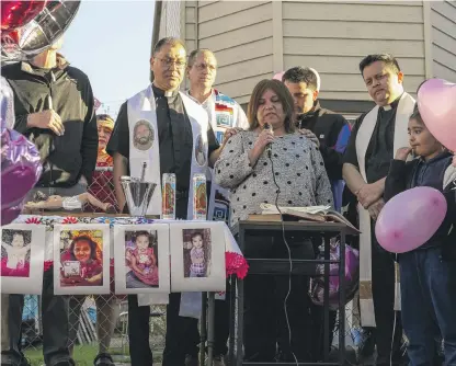  ?? TYLER PASCIAK LARIVIERE/SUN-TIMES ?? Julia Molina, grandmothe­r of Ariana Molina, speaks Monday during a vigil for Ariana and 10 other family members who were shot in the Back of the Yards neighborho­od last weekend.