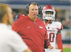  ?? TONY GUTIERREZ/ASSOCIATED PRESS FILE PHOTO ?? Arkansas coach Bret Bielema picks team captains by having offensive players vote for two offensive players and one defensive player and defensive players vote two defense and one offense.