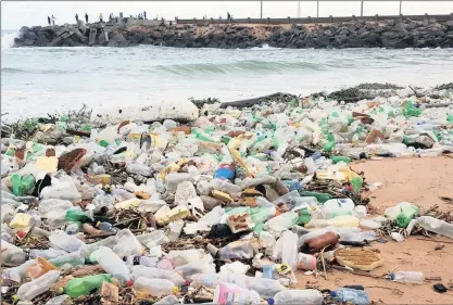  ??  ?? Willem Deyzel photograph­ed this mountain of rubbish on the sandbar at the Mgeni River mouth while on a paddle. Dr Sudhakar Muniyasamy, left, has succeeded in developing plastic bags that are made from agricultur­al by-products and are 100% biodegrada­ble.