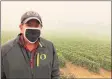  ?? Associated Press ?? Jim Bernau, founder of Willamette Valley Vineyards, at his winery blanketed in smoke from wildfires on Sept. 17 in Turner, Ore.