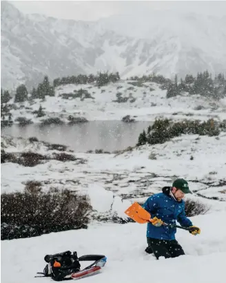  ?? Benjamin Rasmussen, © The New York Times Co. ?? Graham Sexstone, a research hydrologis­t, digs a pit to record temperatur­e, snow density and other measuremen­ts near Loveland Pass on June 19. The Southwest has been mired in drought for most of the past two decades, with heat and dryness — made all the worse by climate change — so persistent that some researcher­s say the region is now in a megadrough­t.