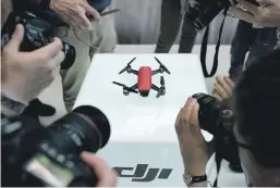  ?? Bloomberg ?? Shenzhen company DJI, which dominates the drone market globally, has won praise for empowering its marketing employees