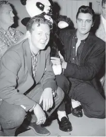  ??  ?? Red Robinson with Elvis Presley before his concert at Empire Stadium on Aug. 31, 1957.