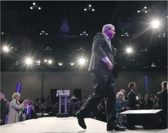  ?? LEAH HENNEL/ CALGARY HERALD ?? Conservati­ve Leader Stephen Harper leaves the stage Monday after his speech to the crowd at the Conservati­ve HQ in Calgary after losing the election.