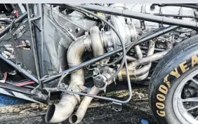 ??  ?? Each side of the billet aluminum Duramax block is flanked by a set of custom fabricated tubular headers feeding a large Bullseye Power turbocharg­er with a Turbosmart Pro-gate 50 waste gate.
