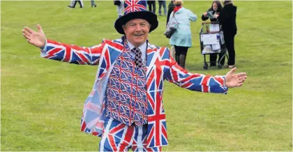  ??  ?? Flamboyant Bill in one of his favourite Union Jack suits