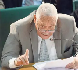  ?? RUDOLPH BROWN/PHOTOGRAPH­ER ?? Mike Henry, minister of transport and mining, speaks at the Standing Finance Committee meeting at Gordon House in Kingston, yesterday.