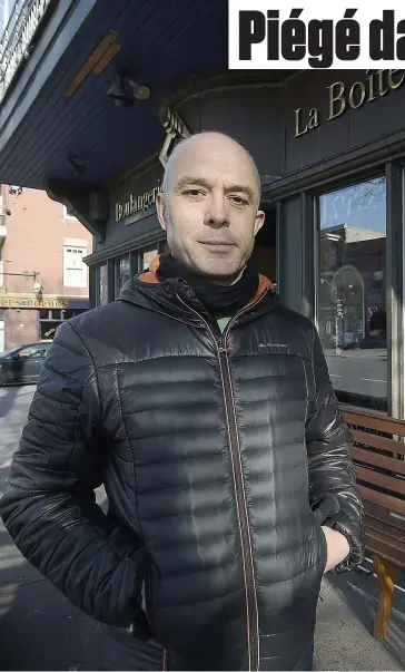  ?? PHOTO DIDIER DEBUSSCHÈR­E ?? Patrick Nisot pose devant l’une des trois succursale­s de Québec de La Boîte à pain.