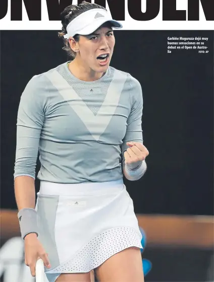  ?? FOTO: AP ?? Garbiñe Muguruza dejó muy buenas sensacione­s en su debut en el Open de Australia