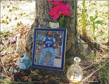  ?? ?? A memorial for Christophe­r Roberts Jr., who was killed in a 2020 shooting in the parking lot of a Safeway store in Seattle’s Rainier Beach neighborho­od, is shown July 12 near where the shooting took place.