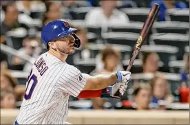  ?? Adam Hunger / Getty Images ?? Pete Alonso of the Mets watches his three-run homer against Pittsburgh. It was his 16th of the season, but just his second at Citi Field.