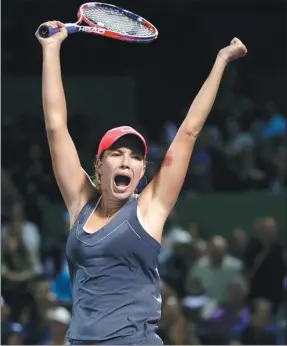  ?? WILFREDO LEE / AP ?? American qualifier Danielle Collins celebrates Wednesday’s 6-2, 6-3 victory over her idol, compatriot Venus Williams, to reach the semifinals of the Miami Open in Florida.