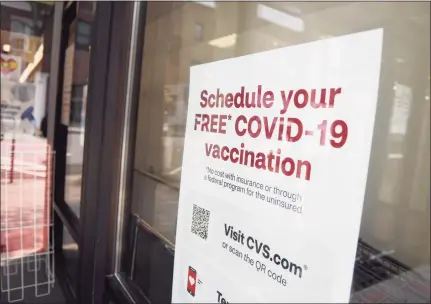  ?? Tyler Sizemore / Hearst Connecticu­t Media ?? A sign promotes COVID-19 vaccines in July at a CVS Pharmacy in Greenwich.