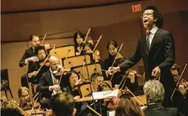  ?? MARCUS YAM/LOS ANGELES TIMES ?? Conductor Jonathon Heyward leads the LA Philharmon­ic as it performs the “Ruslan and Ludmilla” overture in Los Angeles in 2017. Heyward has been named the new music director for the Baltimore Symphony Orchestra.