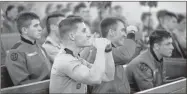  ?? Contribute­d ?? Cadets celebrate as their classmates receive their upcoming Army branch assignment­s during the Army ROTC Palmetto Battalion branching ceremony in Summerall Chapel on Dec. 1.