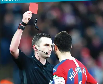  ?? Picture: AFP ?? Crystal Palace captain Luka Milivojevi­c receives a red card via VAR during their FA Cup third round loss to Derby County at Selhurst Park on Sunday.