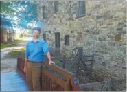  ?? BILL RETTEW JR. – DIGITAL FIRST MEDIA ?? Will Caverly, new executive director at the Mill at Anselma, poses at the new work place.