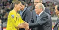  ?? GETTY ?? Hope Solo greets Sepp Blatter after the 2011 FIFA Women’s World Cup in Frankfurt, Germany.