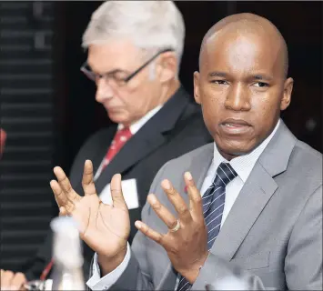  ?? PHOTO: SIMPHIWE MBOKAZI ?? Anton van Wyk, partner at PwC, (left) and Dion Shango, PwC Southern Africa chief executive, while briefing the media at their Annual Global CEO survey held in Melrose Arch, Johannesbu­rg. The survey was released in Davos yesterday.