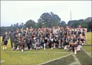  ?? Contribute­d by Gail Conner ?? The Rockmart Middle School football team came up with a big win over Cedartown to claim the FCAA title for 2019.