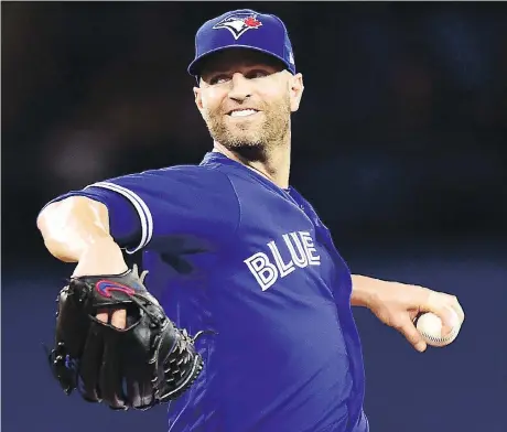  ?? FRANK GUNN/THE CANADIAN PRESS ?? Toronto Blue Jays starting pitcher J.A. Happ allowed just five hits while striking out nine in five innings of work against the Baltimore Orioles Sunday in what might have been his Blue Jays swan song at Rogers Centre.