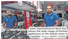  ?? Picture: REINAL CHAND ?? Sales representa­tive Muni Raj shows the wide range of kitchen appliances at the Gokals store in Lautoka.