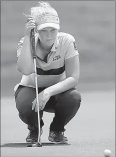  ?? AP/The Canadian Press/FRANK GUNN ?? Canadian Brooke Henderson bogeyed the final two holes, but still managed to hold a two-stroke lead over three others after two rounds of the Meijer LPGA Classic at Grand Rapids, Mich., on Friday.