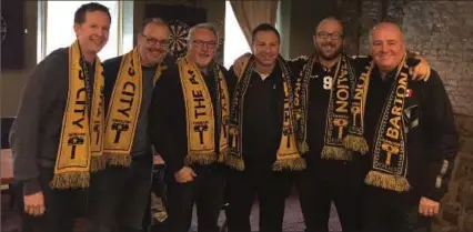  ?? SUBMITTED PHOTO ?? James Hutton, second from right, president of the Barton Street Battalion, is joined by some of the heavy hitters in Hamilton soccer. From left: Kevin Matchett, Hamilton Tiger-Cats; Paul Beirne, project manager Canadian Premier League; John McGrane,...