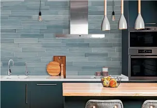  ??  ?? Kitchen splashback­s are just one of many different uses for today’s range of tiles.