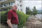  ?? GARY NYLANDER/The Daily Courier ?? Ron Gee, 88, remembers the record high waters of 1948 because they flooded his father Jack’s business, Home Bakery. Today, floodwater­s are approachin­g Gee’s home on the ground floor of the Imperial Apartments on Lakeshore Road.