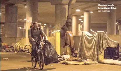  ?? SUN-TIMES FILES ?? Homeless people below Wacker Drive.